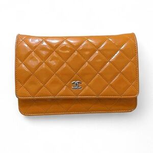 Orange Chanel crossbody bag wallet on chain WOC